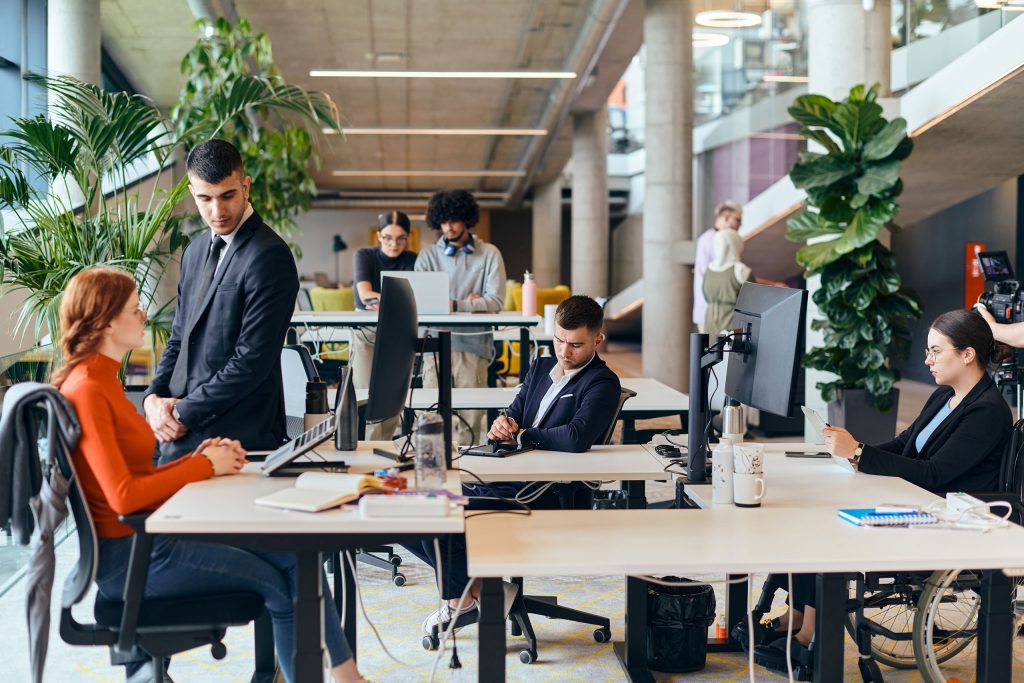 Employees working in a busy office
